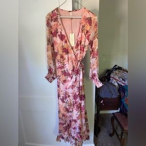 Beautiful wedding guest fall or spring dress. Tag still on never worn.